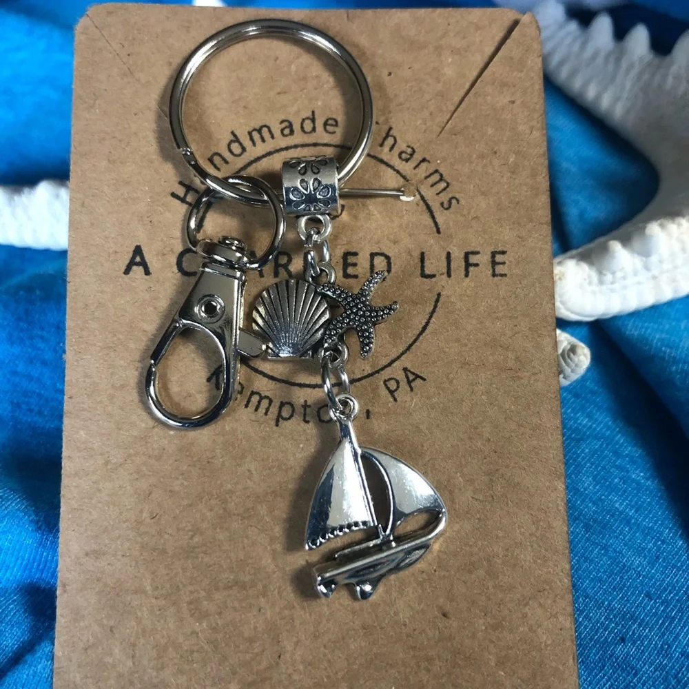 NWT, Handmade by A Charmed Life. Silver Keychain with Nautical Charms